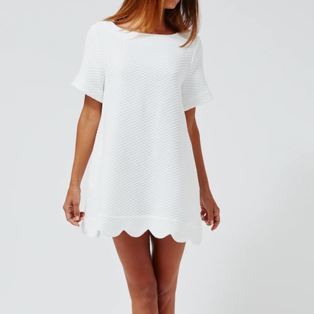 the scallop a-line mini dress in white honeycomb pique cotton
